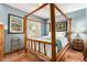 Charming bedroom featuring a unique wooden four-poster bed and rustic accents at 6101 E Thunderbird Rd, Scottsdale, AZ 85254