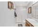 Clean bathroom with a shower, vanity, and neutral decor at 6237 E Boston St, Mesa, AZ 85205