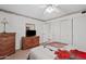 Bright main bedroom featuring a ceiling fan and dresser at 6237 E Boston St, Mesa, AZ 85205