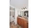 Full bathroom boasts a granite countertop vanity and separate tub with shower at 7521 S College Ave, Tempe, AZ 85283