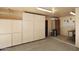 Garage interior with cabinets for storage at 7521 S College Ave, Tempe, AZ 85283