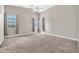 Spacious primary bedroom with vaulted ceilings and natural light at 8465 W Andrea Dr, Peoria, AZ 85383