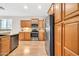 Kitchen with wood cabinets and stainless steel appliances at 8465 W Andrea Dr, Peoria, AZ 85383