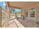Covered patio overlooking a fenced in pool and desert landscape offers a relaxing outdoor area at 8465 W Andrea Dr, Peoria, AZ 85383
