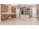 Open kitchen featuring wood cabinetry, granite countertops, and stainless steel appliances at 8647 W Lariat Ln, Peoria, AZ 85383