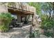 Covered back patio area with furniture set and built-in grill at 9543 E Kiisa Dr, Scottsdale, AZ 85262