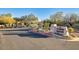Entrance to the gated Community Center featuring desert landscaping and a welcoming entry at 9543 E Kiisa Dr, Scottsdale, AZ 85262