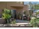 Inviting front entrance featuring mature plants and a well-designed doorway at 9543 E Kiisa Dr, Scottsdale, AZ 85262