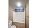 Bright bathroom featuring a shower-tub combo with white tile and small window at 10401 N Saguaro Blvd # 123, Fountain Hills, AZ 85268