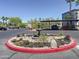 Community water fountain surrounded by a red brick border and palm trees in the background at 10401 N Saguaro Blvd # 123, Fountain Hills, AZ 85268