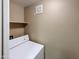 Laundry closet with dryer and single shelf above appliance at 10401 N Saguaro Blvd # 123, Fountain Hills, AZ 85268