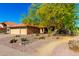 Charming single-story home featuring a low maintenance desert landscape with a three-car garage at 13533 N 91St Way, Scottsdale, AZ 85260