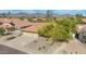 Lovely single-Gathering home with desert landscaping, a tile roof, and a spacious three-car garage for convenient parking at 13533 N 91St Way, Scottsdale, AZ 85260