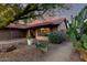 Charming home featuring desert landscaping and a tiled walkway at 13533 N 91St Way, Scottsdale, AZ 85260
