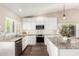 Beautiful kitchen with stainless steel appliances, custom cabinetry, and a center island with granite countertops at 13533 N 91St Way, Scottsdale, AZ 85260