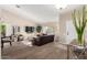 Bright living room featuring hardwood floors, recessed lighting, and comfortable seating arrangements at 13533 N 91St Way, Scottsdale, AZ 85260