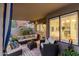 Cozy covered patio with comfortable seating, perfect for outdoor relaxation and entertaining at 13533 N 91St Way, Scottsdale, AZ 85260