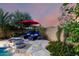 A stunning backyard featuring a refreshing pool, lounge chairs, and desert landscaping at 13533 N 91St Way, Scottsdale, AZ 85260