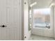 Updated walk-in shower with rain shower head and decorative tile at 13533 N 91St Way, Scottsdale, AZ 85260