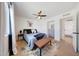 Bright bedroom featuring stylish furniture, and easy access to both a closet and the bathroom at 1511 E Carol Ave, Phoenix, AZ 85020