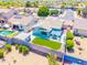 An aerial view of a single Gathering home with a fenced backyard, and a small area of artificial grass at 1550 W Saint Kateri Dr, Phoenix, AZ 85041