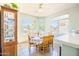 Charming dining area features a large window and a dining table with seating for six people at 1550 W Saint Kateri Dr, Phoenix, AZ 85041