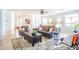 Bright and spacious living room with tile flooring, ceiling fan, and ample natural light for a relaxing atmosphere at 1550 W Saint Kateri Dr, Phoenix, AZ 85041