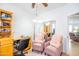 Bright office with an executive desk, office chairs, and a decorative chandelier at 1550 W Saint Kateri Dr, Phoenix, AZ 85041
