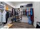 Spacious walk-in closet with ample shelving and hanging storage at 15665 W Coronado Rd, Goodyear, AZ 85395