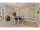 A well-lit dining area features a table, chairs, and wall décor with an 'EAT' sign at 15665 W Coronado Rd, Goodyear, AZ 85395