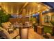 Enjoy the outdoor kitchen featuring bar seating, integrated grill, and under-counter refrigeration at 15665 W Coronado Rd, Goodyear, AZ 85395