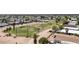 Aerial view of a community with golf course, roads, and lush landscaping at 1641 S Sossaman Rd, Mesa, AZ 85209