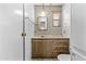 Bathroom features a sink, vanity, mirror, and a toilet in the corner at 1641 S Sossaman Rd, Mesa, AZ 85209