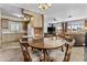 Open-concept space seamlessly connects the kitchen, dining, and living areas, perfect for entertaining at 1641 S Sossaman Rd, Mesa, AZ 85209