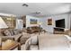 The living room offers a comfortable seating arrangement with natural light, creating an inviting atmosphere at 1641 S Sossaman Rd, Mesa, AZ 85209