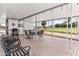 Covered patio perfect for outdoor entertaining with ample seating, a grill, and views of the surrounding landscape at 1641 S Sossaman Rd, Mesa, AZ 85209