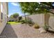 Low maintenance backyard featuring gravel, desert plants, and a tranquil setting at 16466 W Lariat Ln, Surprise, AZ 85387