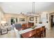 Inviting living space with comfortable seating and seamlessly connected to the dining area at 16466 W Lariat Ln, Surprise, AZ 85387
