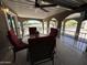 Enjoy the outdoor covered patio with comfortable seating and bright natural light at 17200 W Bell Rd # 1202, Surprise, AZ 85374