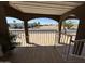 Neutral toned covered patio offers community views, ceiling and a tile floor at 17200 W Bell Rd # 1202, Surprise, AZ 85374