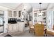 Open floor plan integrating living, kitchen, and dining spaces, featuring stylish furnishings at 17200 W Bell Rd # 1202, Surprise, AZ 85374