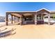 Inviting home featuring a covered carport and charming front porch area at 17200 W Bell Rd # 1202, Surprise, AZ 85374