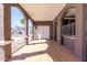 Home featuring covered walkway, white trim, and outdoor access at 17200 W Bell Rd # 1202, Surprise, AZ 85374