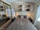 Comfortable main bedroom with built-in storage and soft, neutral tones at 17200 W Bell Rd # 1202, Surprise, AZ 85374