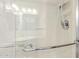 Modern tiled shower features glass doors and chrome fixtures at 17200 W Bell Rd # 1202, Surprise, AZ 85374