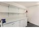 Bright work area with shelving and cabinet space at 17200 W Bell Rd # 1202, Surprise, AZ 85374