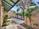 Private patio area featuring desert landscaping, block wall and shade provided by mature trees at 17838 N 45Th Ave, Glendale, AZ 85308