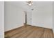 Spacious bedroom with light-colored walls, vinyl floors, ceiling fan, and a closet with a door at 17838 N 45Th Ave, Glendale, AZ 85308