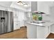 Well-lit kitchen boasts stainless steel appliances and skylight at 17838 N 45Th Ave, Glendale, AZ 85308