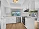 Bright, updated kitchen features stainless steel dishwasher, oven, and sink at 17838 N 45Th Ave, Glendale, AZ 85308